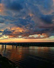 Naklejka premium sunset over the river