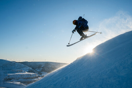 Silhouette of a man skiing in the Chic Chocs in Quebec Canada