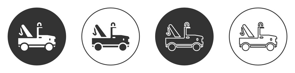 Black Tow truck icon isolated on white background. Circle button. Vector.