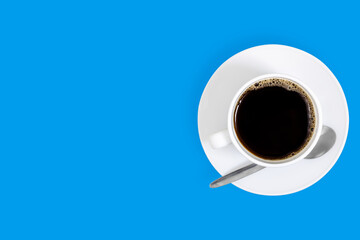 White cups with coffee on a bright colored background.