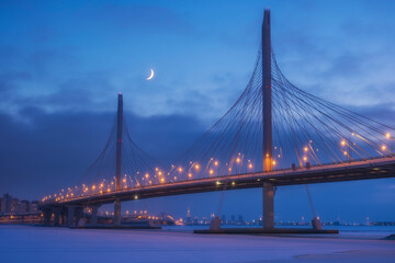 View of the Western High-Speed â€‹â€‹Bridge Diameter. Krestovsky Island. Backlit winter night Russia, St. Petersburg.