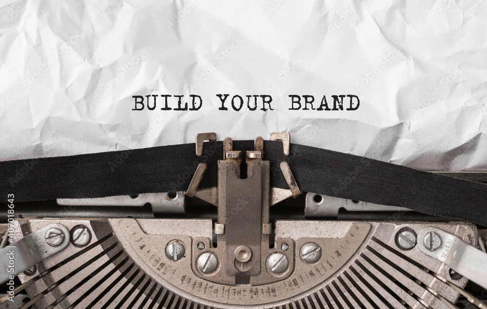Poster text build your brand typed on retro typewriter