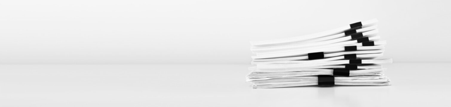 Stack of report paper documents for business desk, Business papers for Annual Reports files. Business and financial concept.