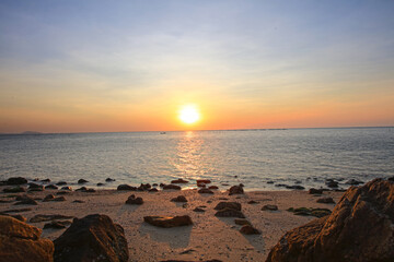 Fototapeta premium Natural sun set or sunrise over the sea , Sunset on blue ocean, The coast of Bangsean Chonburi, Thailand