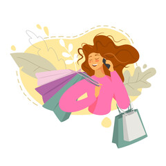 Happy young woman with shopping bags.