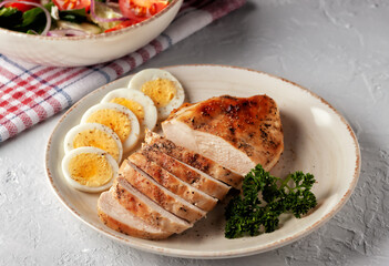 Grilled chicken fillet with fresh vegetable salad