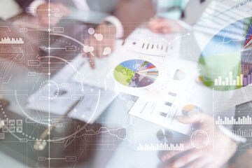 Financial dashboard with business intelligence BI. Blurred businessmen in the office.