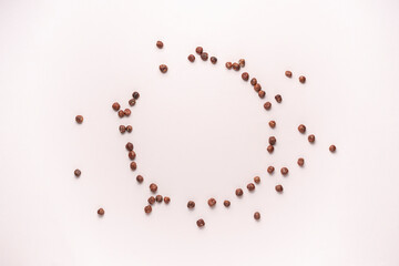 dropped bunch of hazelnut nut without shell flat lay, minimalistic raw food