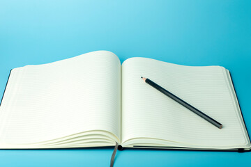 Notepad for sticky notes on the desktop. Office desktop, management and timing concept.