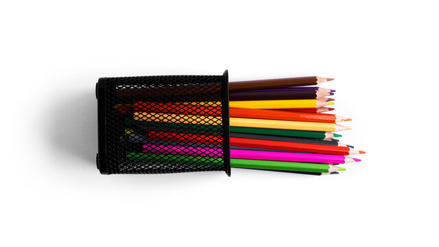 Colorful pencils in the organizer are isolated on a white background.