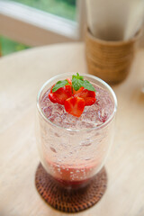Strawberry with soda and ice ,cocktail soft drink.