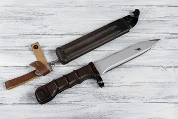 Bayonet-knife for a machine gun and a scabbard for it