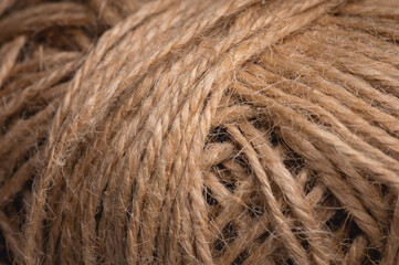Natural rope twine textured background close up plan. Fibers in a mess rustic style