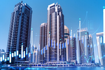Obraz premium Skyscrapers of Dubai business downtown. International hub of trading and financial services of Western Asia. FOREX graph and chart concept. Double exposure. Dubai Canal waterfront.