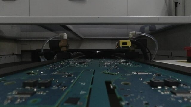 first-person perspective (FPP) camera view for a printed circuit board that entering reflow oven for the cooking process