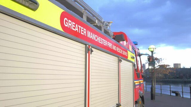 Greater Manchester Fire and Rescue Service Engine overlooking water 2
