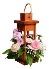 Wooden decorative lantern with flowers over white.