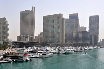 Obraz na płótnie Canvas Tall houses in the United Arab Emirates 