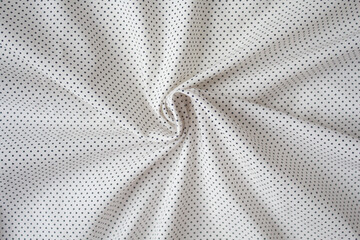texture cotton fabric in white with a pattern of black dots, background