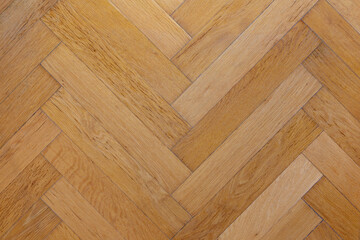 Classic herringbone parquet floor made of natural wood, background image - 407036275