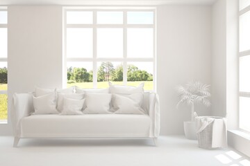 White living room with sofa and summer landscape in window. Scandinavian interior design. 3D illustration