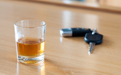 Alcoholic drink and car keys - do not drink and drive concept