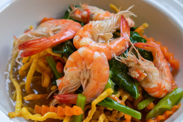 Boiled shrimp on top of the noodles