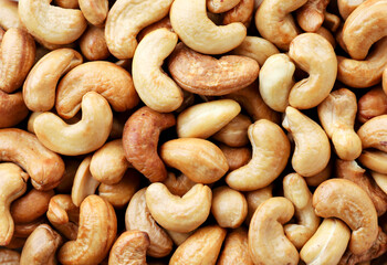 Roasted cashew nuts background. The view from top - 407042220