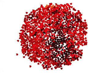 Scattered red hearts in the center of the frame in the form of a ball.