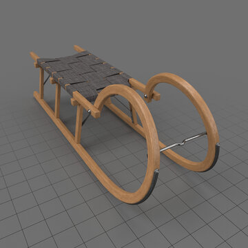 Sled with strap seat