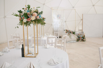 Decorated decorated tables at the wedding