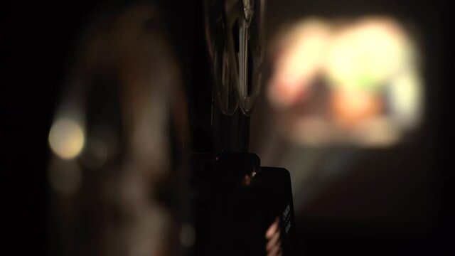back view of super 8 camera film projector ray, cinematography light