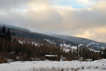 Fototapeta na wymiar View of Swieradow Zdroj resort in Izera Mountains, part of Western Sudetes range in winter, south-western Poland