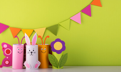 handmade toilet paper roll toys for children, bunnies butterflies birds. needlework is a craft made of paper