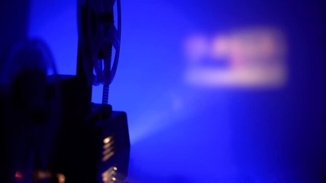 super 8 camera film projector, cinematography blue light and smoke