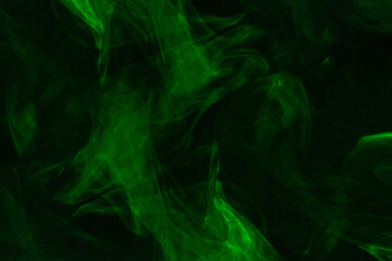 Green steam on a black background.