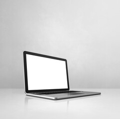 Laptop computer on white concrete office scene background
