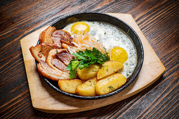 tasty breakfast on the wooden background