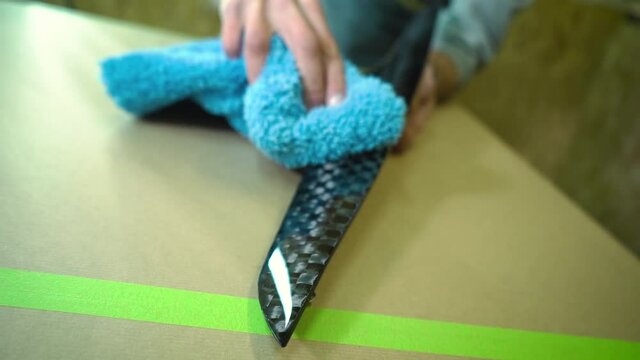 Carbon part after polishing, wipe with microfiber