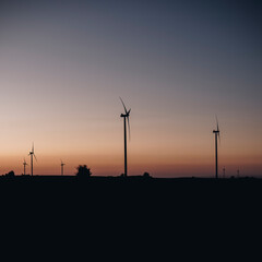 Fototapeta na wymiar silhouette landscape with wind turbines