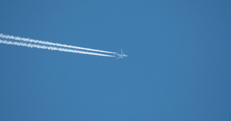 Commercial Airliner With Contrails