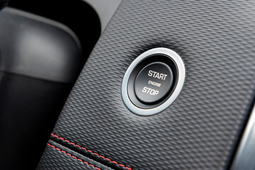 Engine start stop button in modern car close