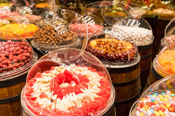 Close up bright photo of assorted sweets in shop