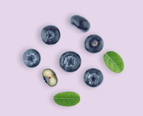 blueberries with green leaf isolated on background. top view