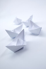 paper boats on the white