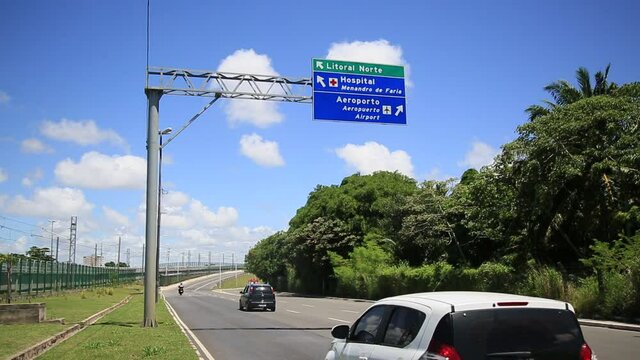 salvador, bahia, brazil - january 18, 2021: movement of vehicles on a road near the Salvador International Airport.