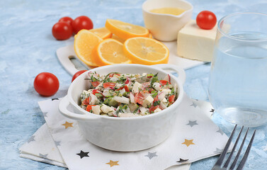 Vegetable salad with mozzarella cheese, cherry tomatoes and fresh arugula, Healthy natural breakfast with lemon, detox diet.Traditional Italian food,, cholesterol and GMO free, selective focus