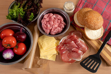 burger cheeseburger hamburger tomato minced meat bun greens onion cheese ingredients