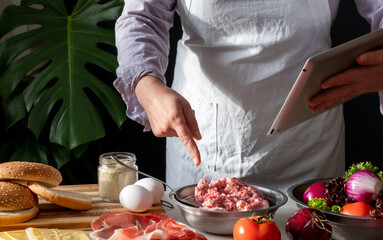 burger cheeseburger hamburger big chef hands cooking tablet home