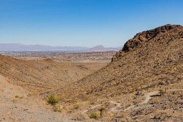 Fototapeta na wymiar Sunny view of the beautiful landscape around Petroglyph Canyon Trail